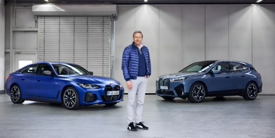 올리버 집세(Oliver Zipse) BMW 최고경영자(CEO)가자사 차량을 배경으로 포즈를 취하고 있다. (사진=BMW)